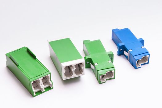 Group of singlemode and multimode fiber optic adapters SC and LS
