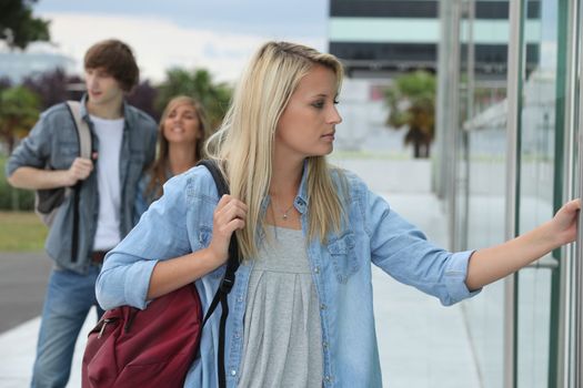 Students entering university building