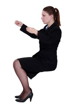 Businesswoman practicing breathing techniques