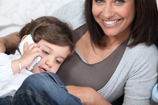 Child using his mother's cellphone