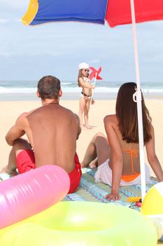 Family having fun at the beach