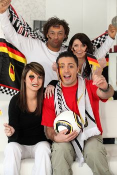 A group of friends supporting the German football team