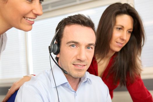 Man training with a telephone headset