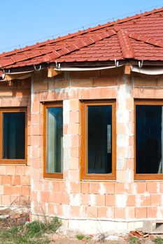 Roof and walls structure of house in construction