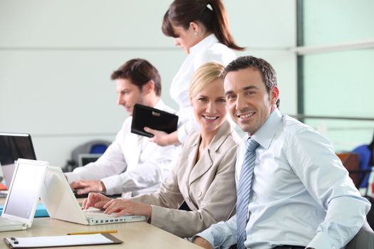 Colleagues working in an office