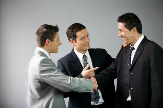 Three businessmen laughing