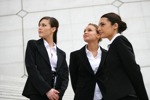 Three elegant businesswomen