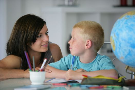 Mother teaching son geography