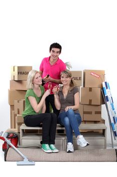 young people celebrating their new apartment