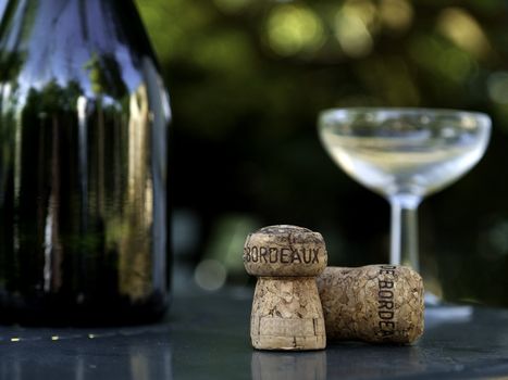 winebottle, glass and cork in bordeaux france