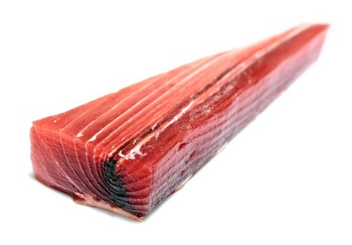 A piece of raw fresh tuna with shallow depth of focus