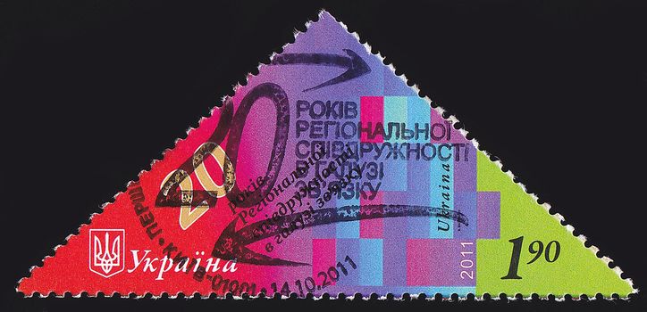 UKRAINE - CIRCA 2011: A post stamp printed in Ukraine devoted to 20th Annyversary of the Regional Commonwealth in the Field of Communications, circa 2011.