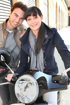 Couple with scooter