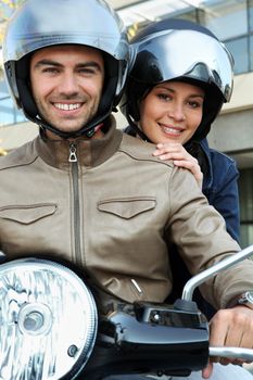 Couple on scooter