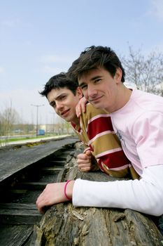 two teen boys outdoors