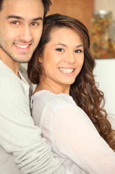 Smiling couple indoors