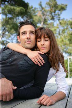 couple embracing outdoors