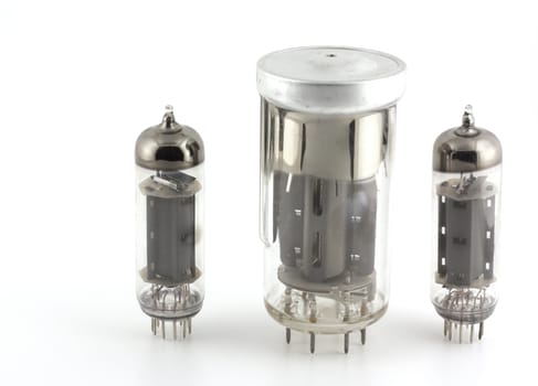 Big and medium old triodes (valves) over white