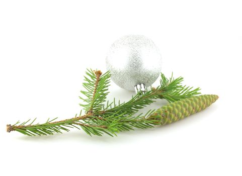 Firry twig and silver sphere over white