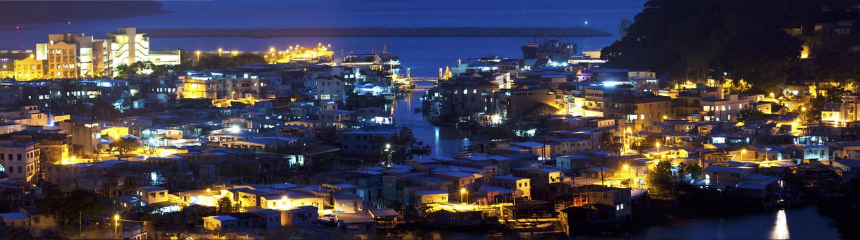 Tai O fishing village at night wide shot in Hong Kong