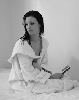 Portrait of Fresh and Beautiful brunette woman wearing white bathrobe