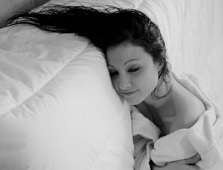 Portrait of Fresh and Beautiful brunette woman wearing white bathrobe