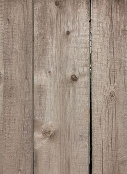 Close up of gray wooden fence panels 