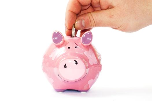 man hand on piggy bank