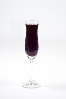 red wine in fine glass on white background
