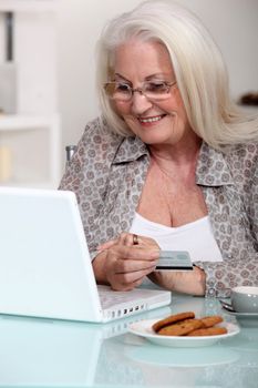 senior lady shopping on the internet