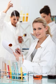 Three women in laboratory