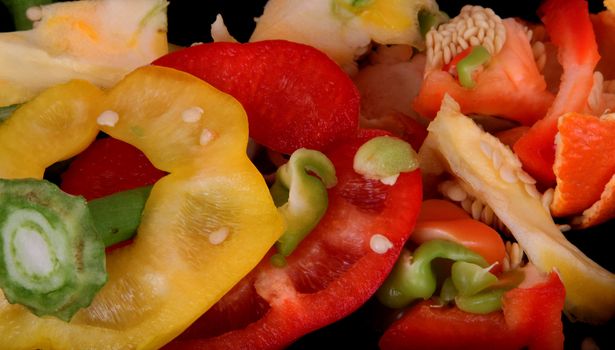 Peelings from preparing peppers to eat on a white background.