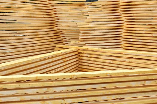 stowed planks left to dry near a sawmill