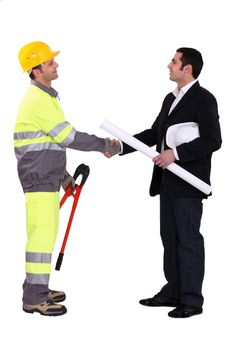 An engineer shaking hands