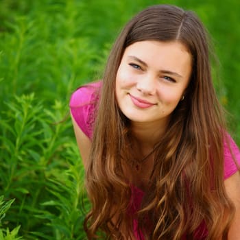 woman in grass close up