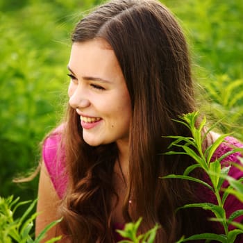 woman in grass close up