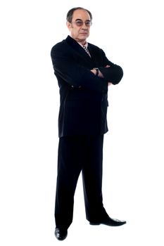 Matured businessperson with crossed arms on white background