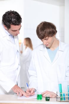 student and teacher in lab class