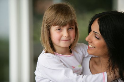 Mother and daughter at home