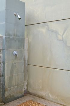 detail of a old shower in bathroom