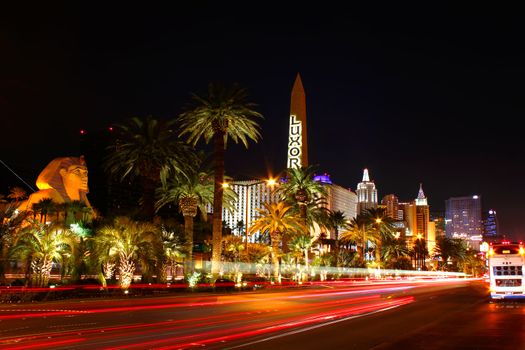 Las Vegas, USA - October 29, 2011: Las Vegas Boulevard is often referred to as the Strip and contains a plethora of extravagant resort casinos.  Seen here is the south end of the Strip with Luxor Las Vegas, Excaliber Hotel and Casino, and the New York New York Hotel and Casino at night.