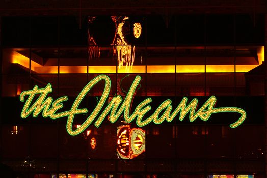 Las Vegas, USA - November 30, 2011: The lights of The Orleans Hotel and Casino Sign above the main entrance showcase the Mardi Gras theme of the property.  The Orleans was opened in Las Vegas, Nevada in the year 1996.