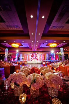Image of a beautifully decorated ballroom for an Indian wedding reception