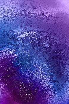 abstract spacy background with flocking out violet and blue dye colors