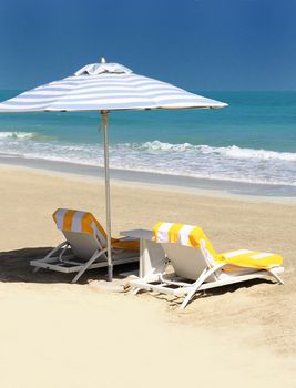 view of chairs and nice umbrella on the beach