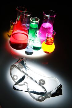 Labor scene with testtubes and beaker and glasses, safety first!