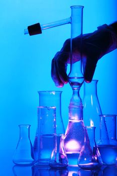 Labor scene with testtubes and beaker