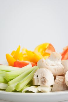 Fresh, juicy and colorful vegetable platter closeup