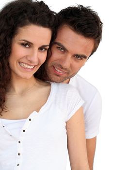 Couple in front of blue wall