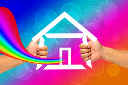 Hand and icon house with Rainbow